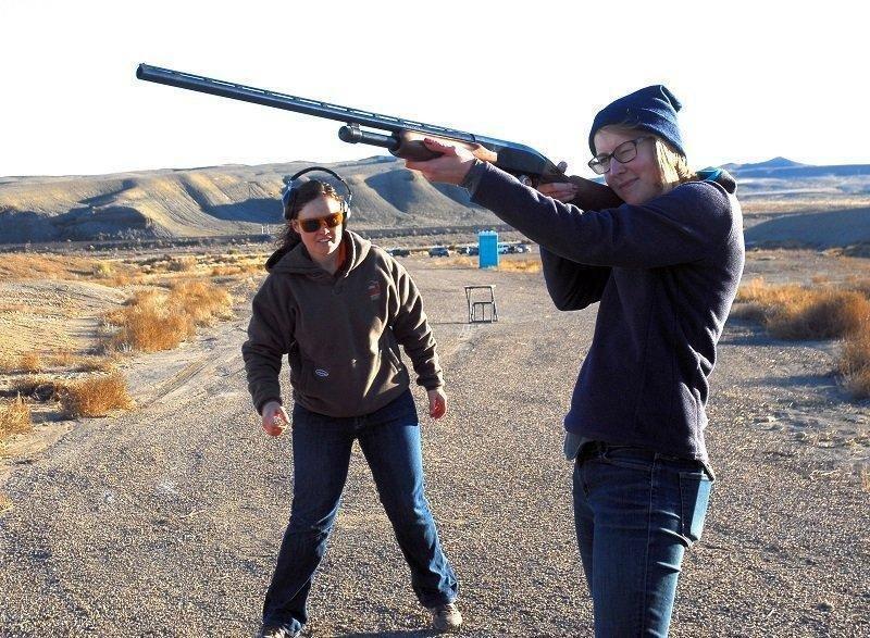 2015_attendee_learns_how_to_shoot_a_shotgun_at_Gals_and_Guns_shooting_event.jpg
