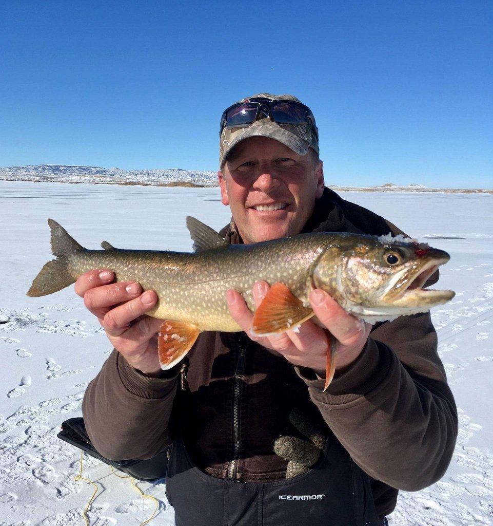 ryan_mosley_1-27-2017_angler_shows_smaller_lake_trout_caught_at_Flaming_Gorge_Reservoir.jpg