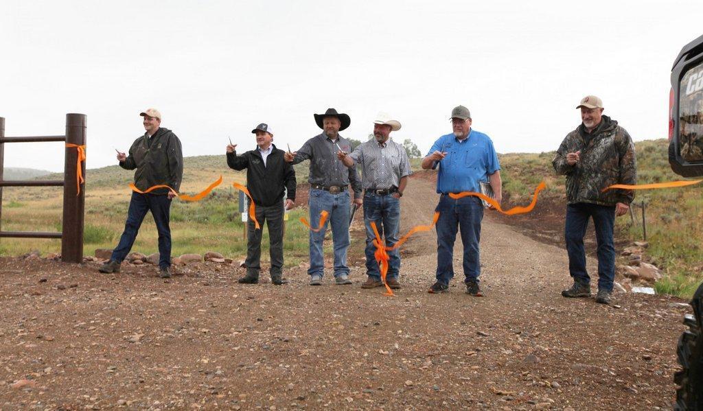 mark_hadley_8_5_2022_LEFT_to_RIGHT_Mike_Canning_DWR_Gary_Jenkins_MDF_Troy_Justenson_SFW_Mike_Laughter_Ron_Camp_RMEF_and_Todd_Adams_DNR_cut_the_ribbon_at_Cinnamon_Creek_WMA_ribbon_cutting-scaled.jpg