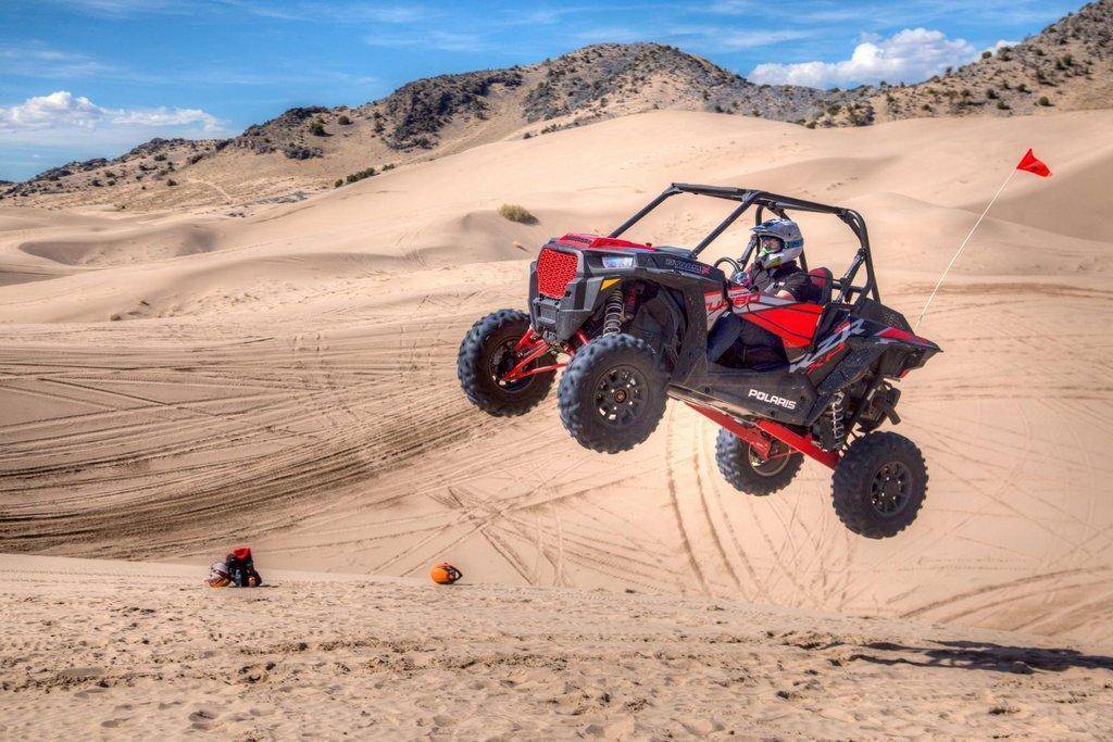 A-man-jumps-his-OHV-off-a-sand-dune-at-Little-Sahara-Recreation-Area.-Photo-by-Bob-Wick-BLM.-scaled.jpg