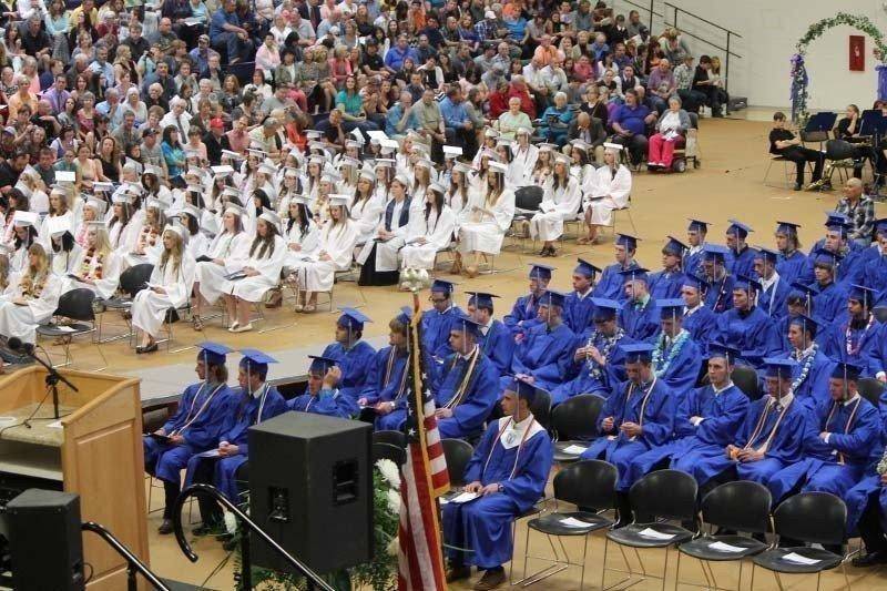 Graduates-listen-attentively.jpg