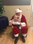 Sitterud-grandbaby-and-santa-e1576521752527.jpg