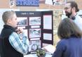 Student-talks-about-his-history-display-with-judges-at-last-years-history-fair.jpg