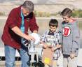 Thomas-with-kids-testing-water-wheel.jpg