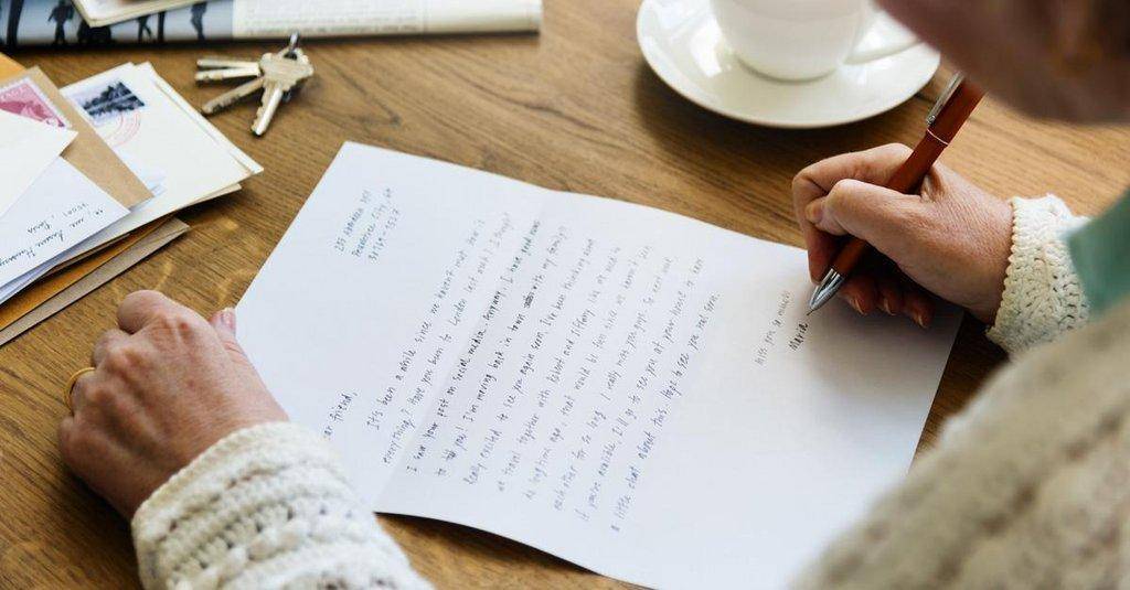 elderly-woman-writing-letter.jpg