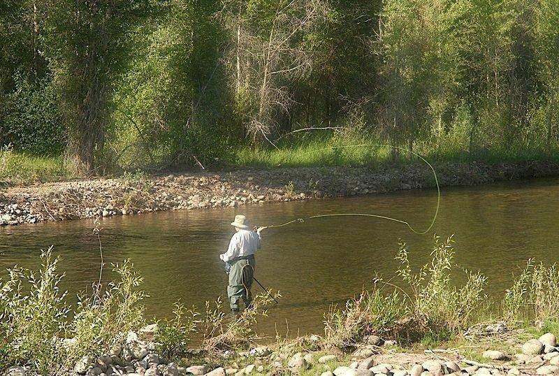 kirk_gardner_angler_flyfishing_on_a_river.jpg