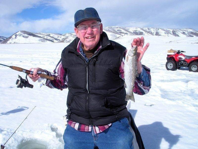 randall_stilson_12-10-2013_ice_elderly_angler_with_rainbow_at_scofield.jpg